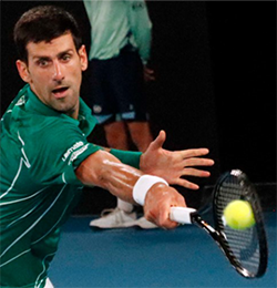 Novak Djokovic reaching out for a backhand hit