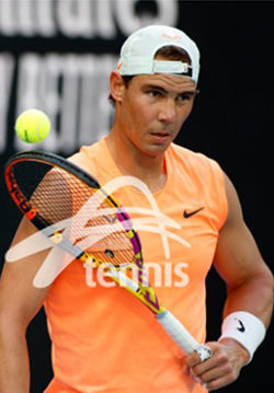 Rafael Nadal in orange shirt