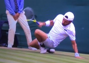 Matteo Berretini falling on tennis court