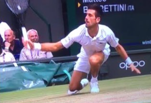 Novak Djokovic slipping on grass court