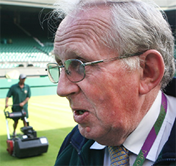 Man being interviewed on tennis court