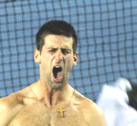 Tennis player with no shirt yelling