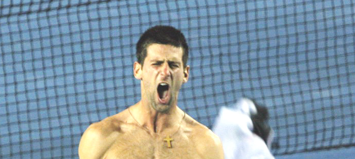 Tennis player with no shirt yelling
