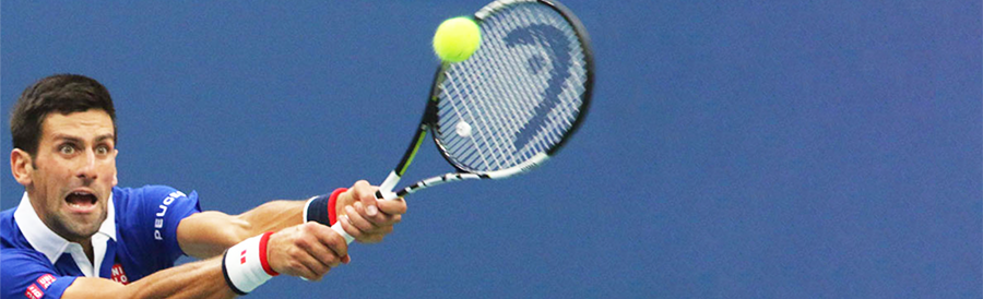 Novak Djokovic hitting tennis ball